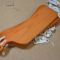 Solid wood cutting board paddle light brown color