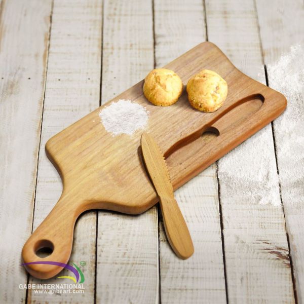 Teak rectangular cutting board and wooden knife
